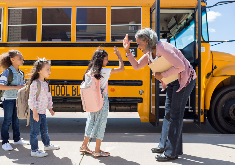 STUDENTS GETTING ON BUS
